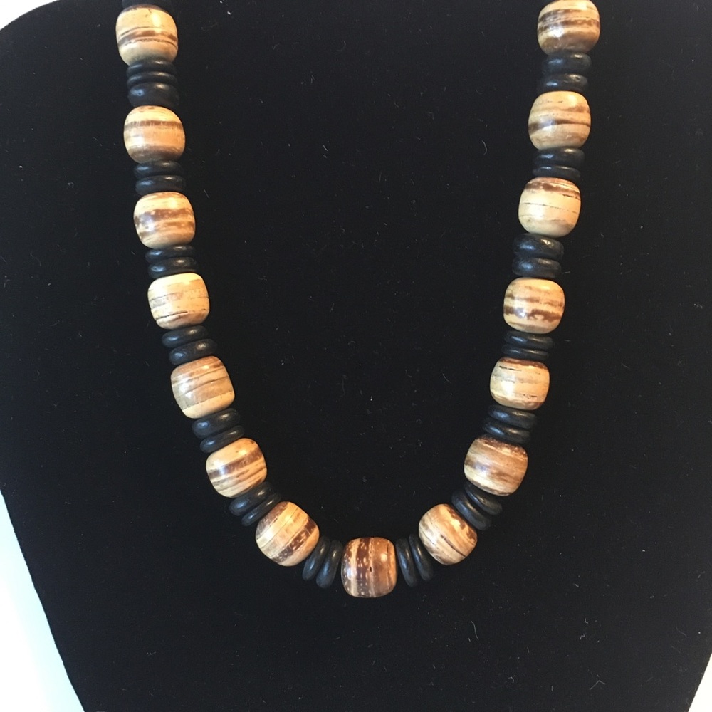 Brown and black beaded necklace on elastic string